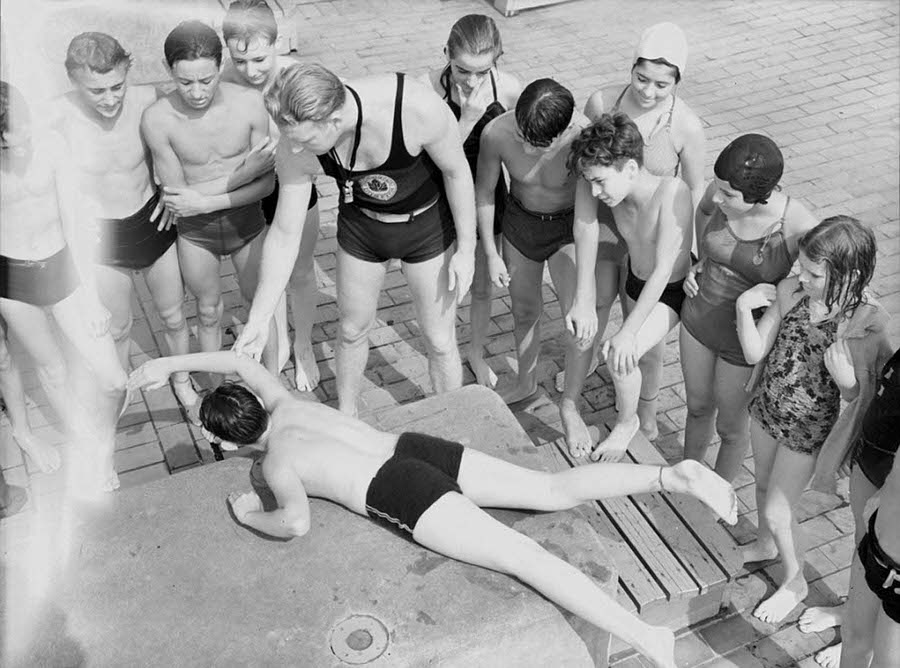 Children learning to swim during a class session at the Astoria Pool, 1940.