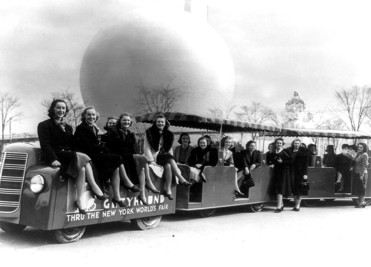 Members of the New York World's Fair staff on a tractor train, 1939.