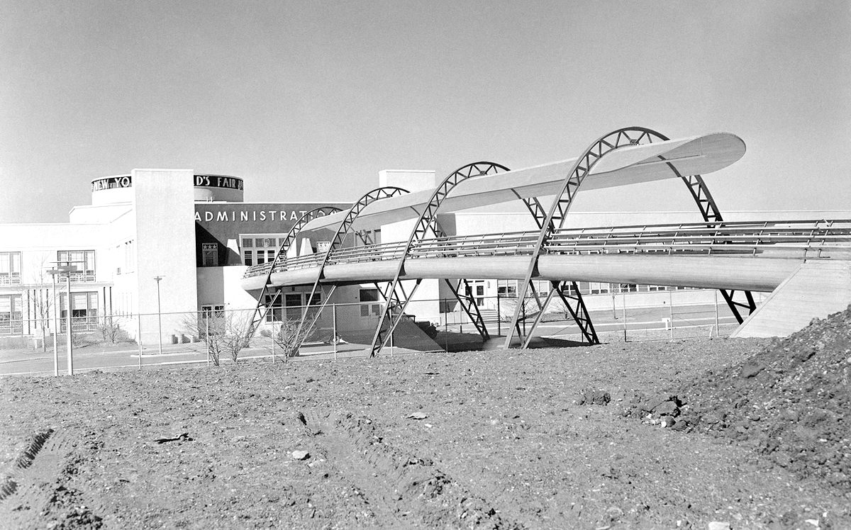 During construction, a bridge leads from the administration building to the exhibit area of the New York World's Fair, 1938.