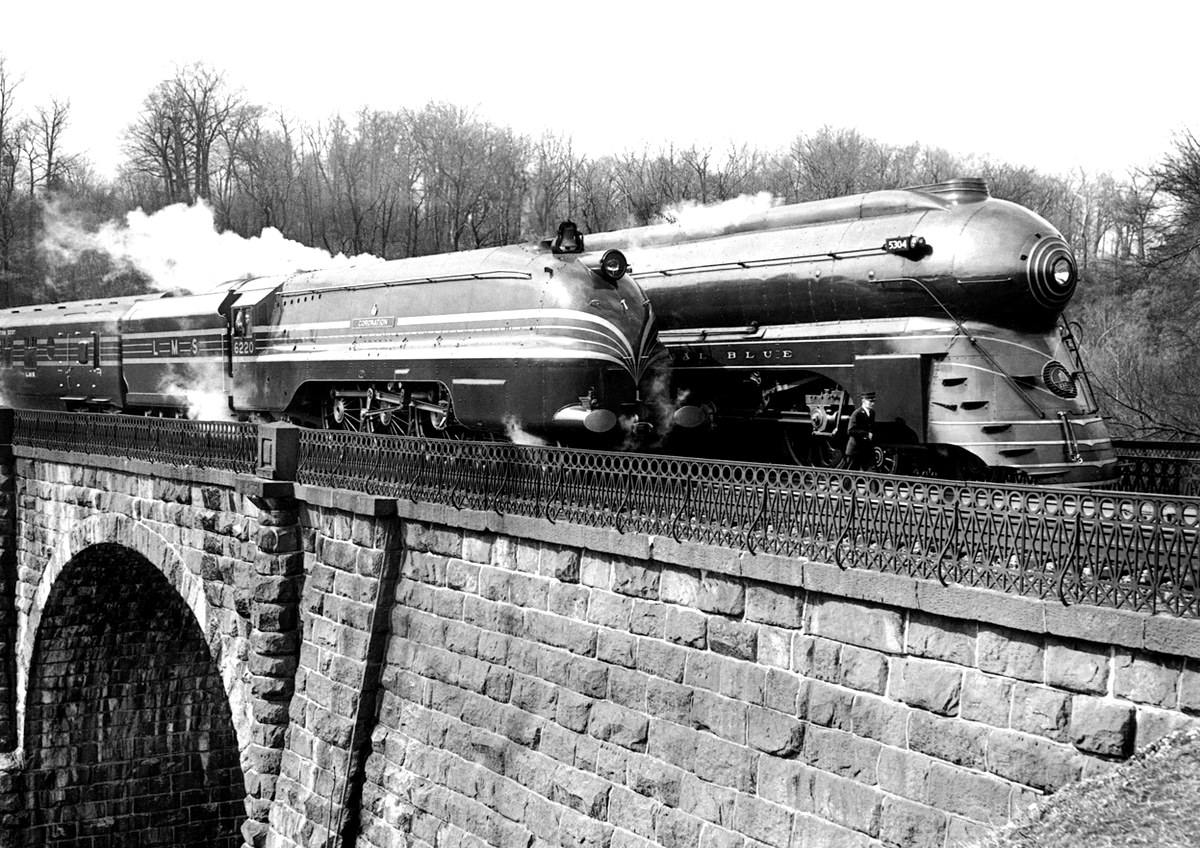 The Coronation Scot stops on a bridge near Washington, alongside the American train Royal Blue, 1939.