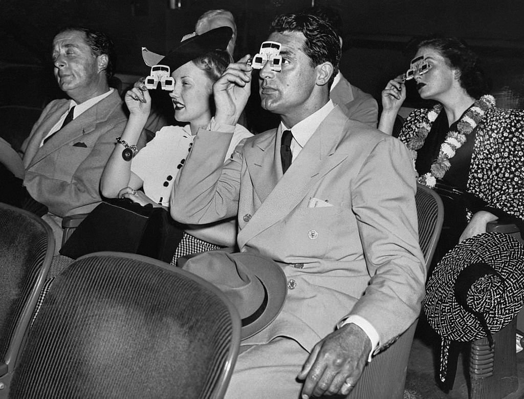 Cary Grant and Phyllis Brooks at the Polaroid movie in the Chrysler Building at the New York's World Fair.