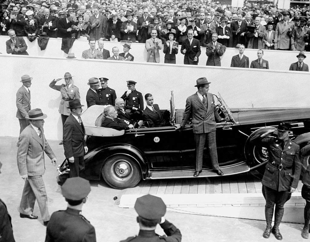 President Franklin D. Roosevelt arriving at the 1939 World's Fair with his son John and the U.S. Commissioner, 1939.