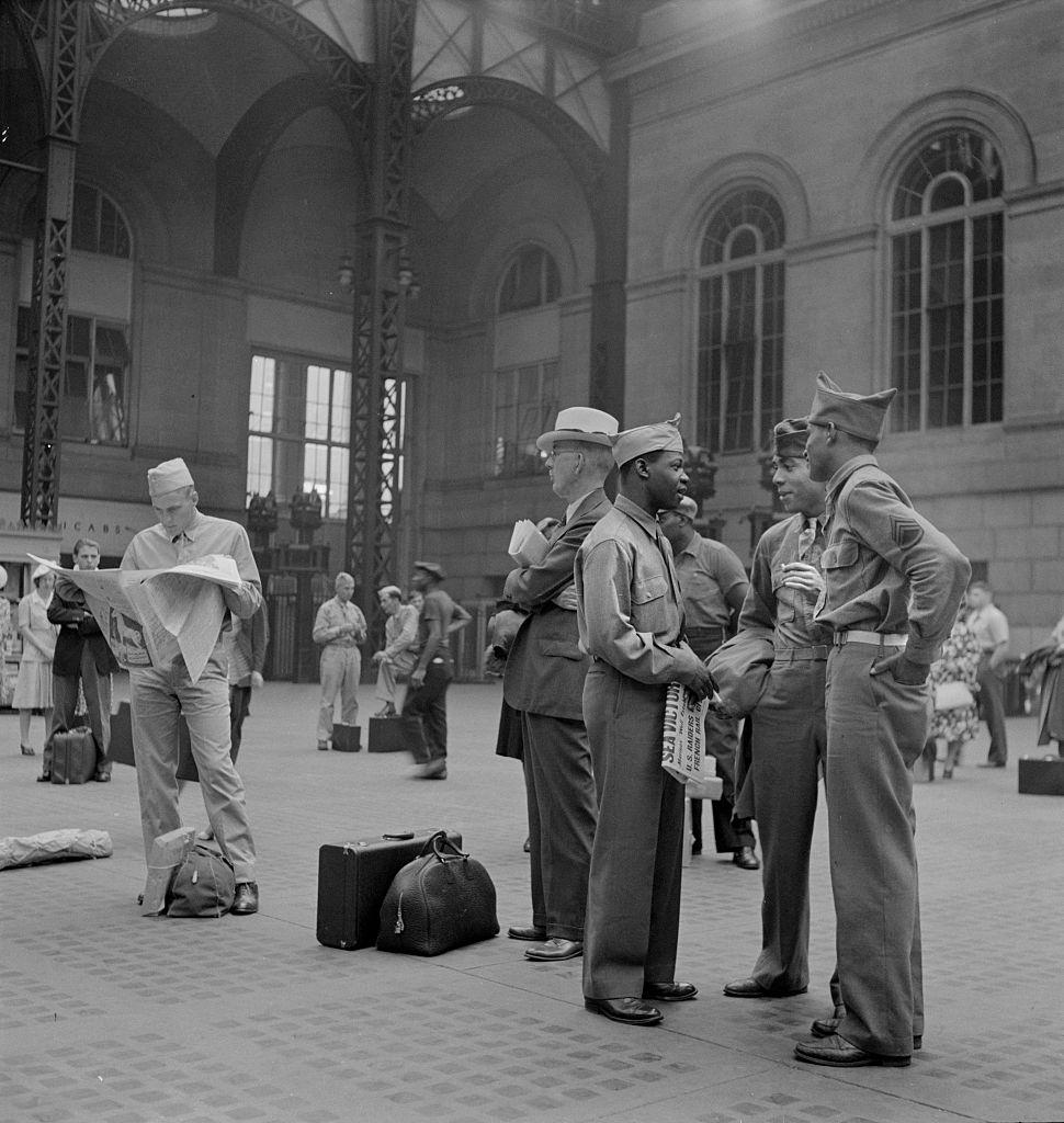 Soldiers waiting for train at Pennsylvania Station, New York City, 1942.