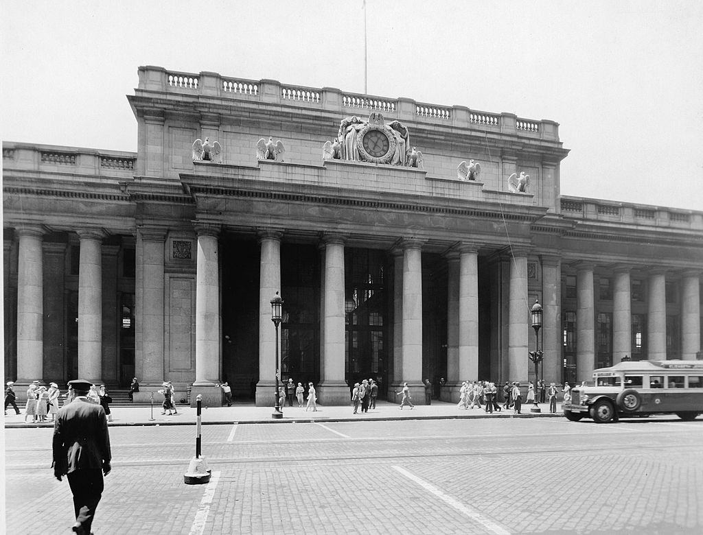 View of the front facade of Pennsylvania Station, New York, 1930s.