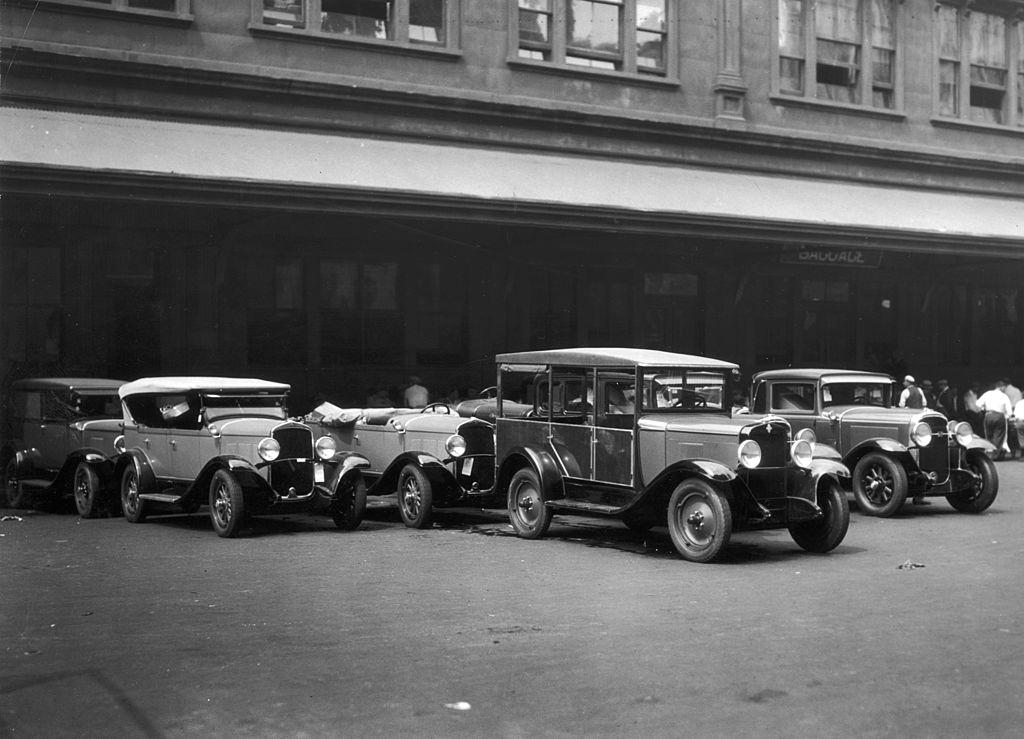 Cars parked outside of Pennsylvania Railroad Station, 1935.