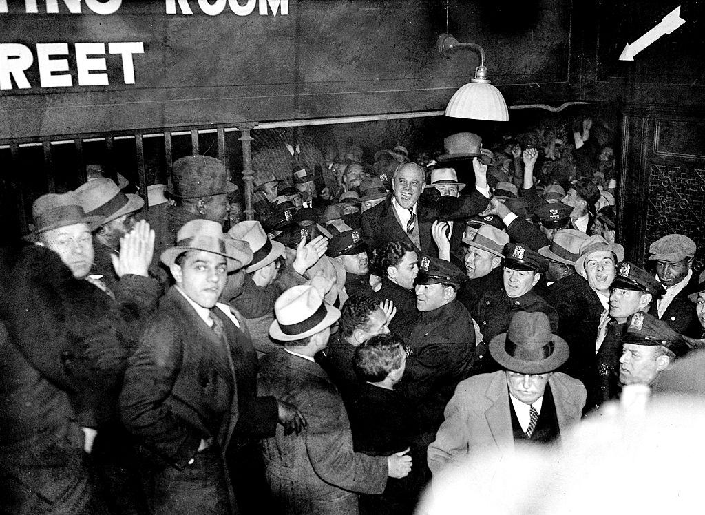 Wildly cheering, 3,000 men, women and children gather at Pennsylvania Station to greet Samuel Leibowitz, 1933.