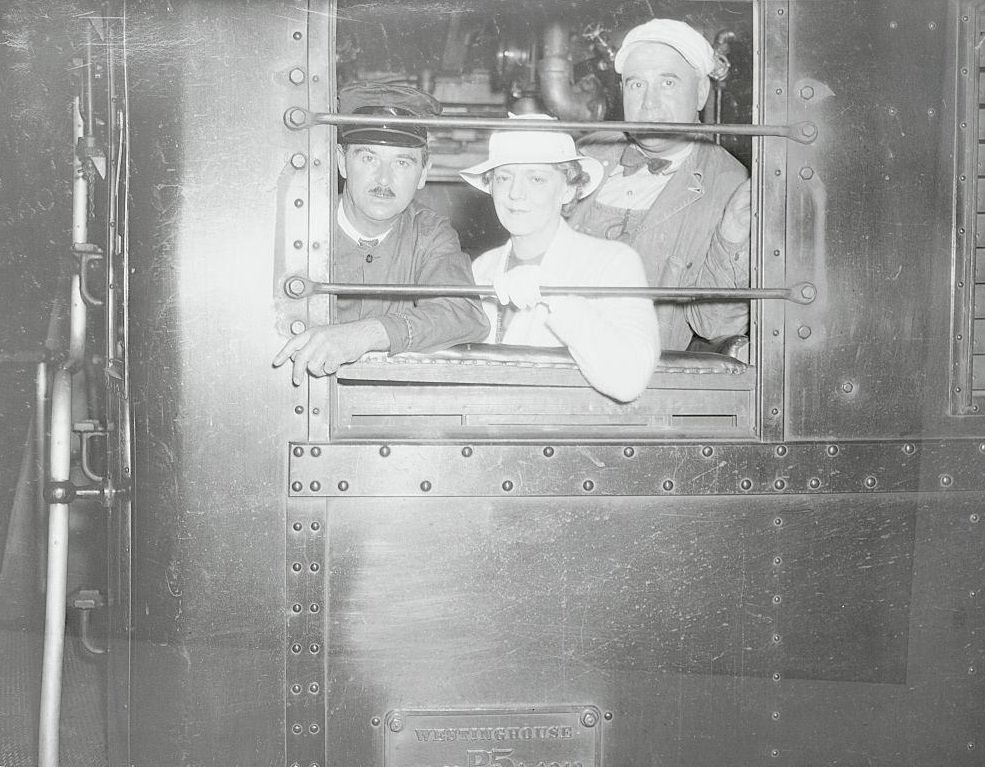 Ethel Barrymore with two train engineers, 1933.