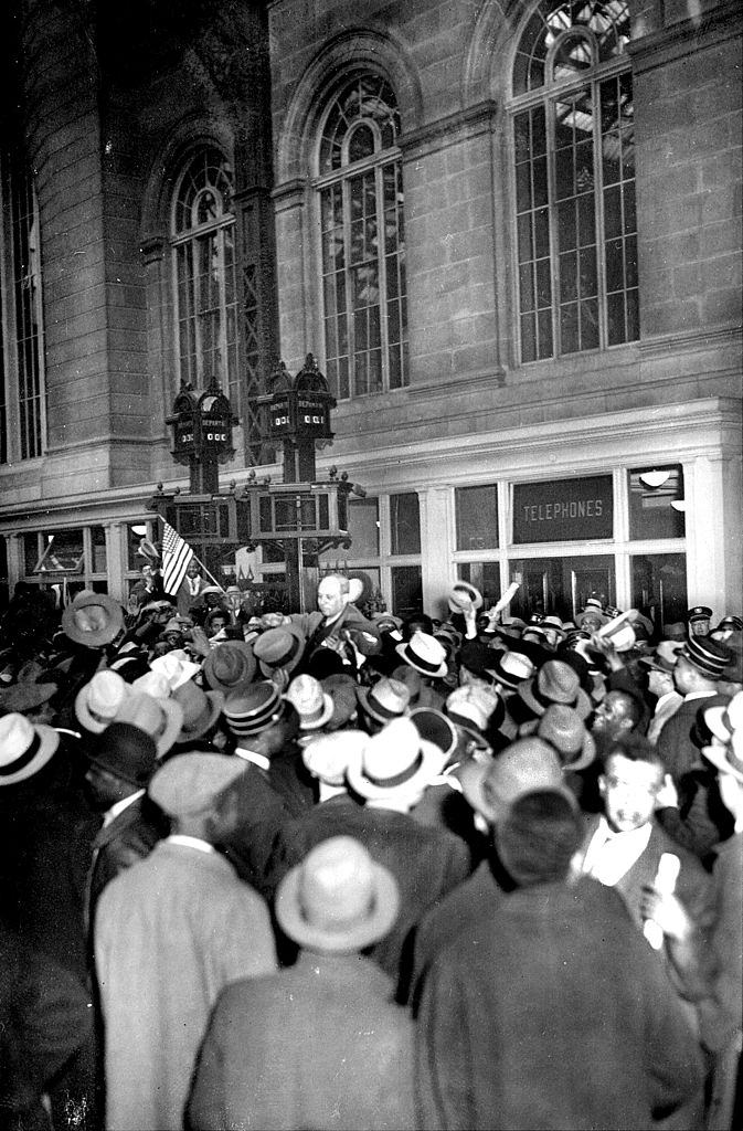 A cheering crowd carries Samuel Leibowitz, 1933.