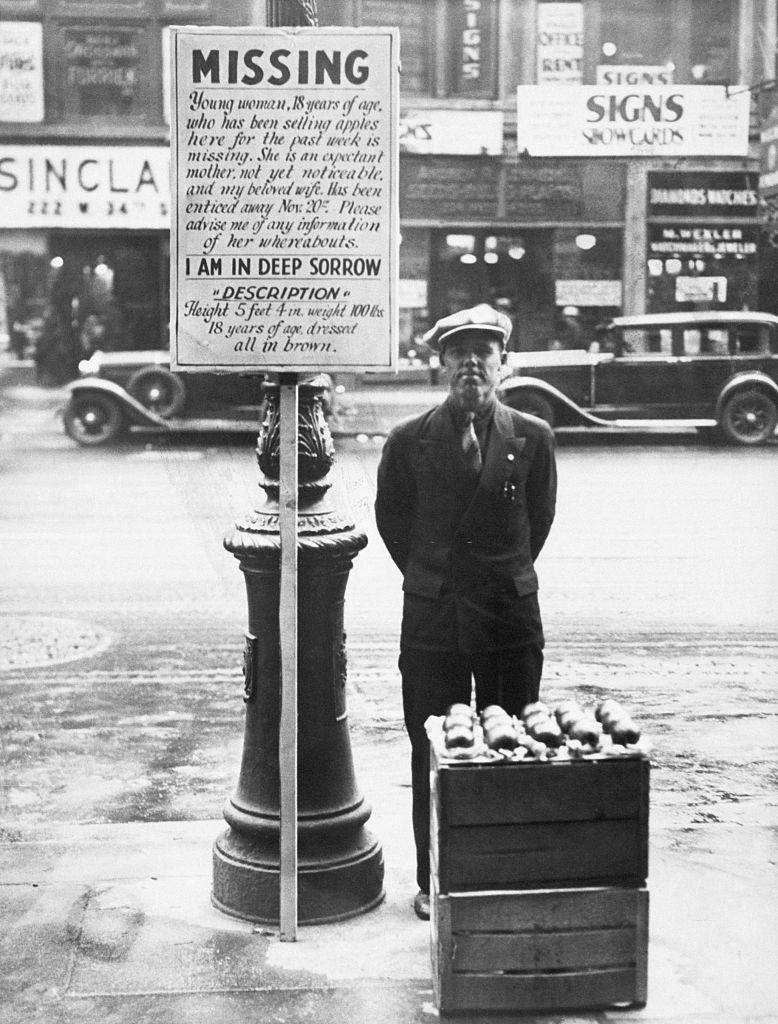 Man selling apples on 8th Avenue, 1930.