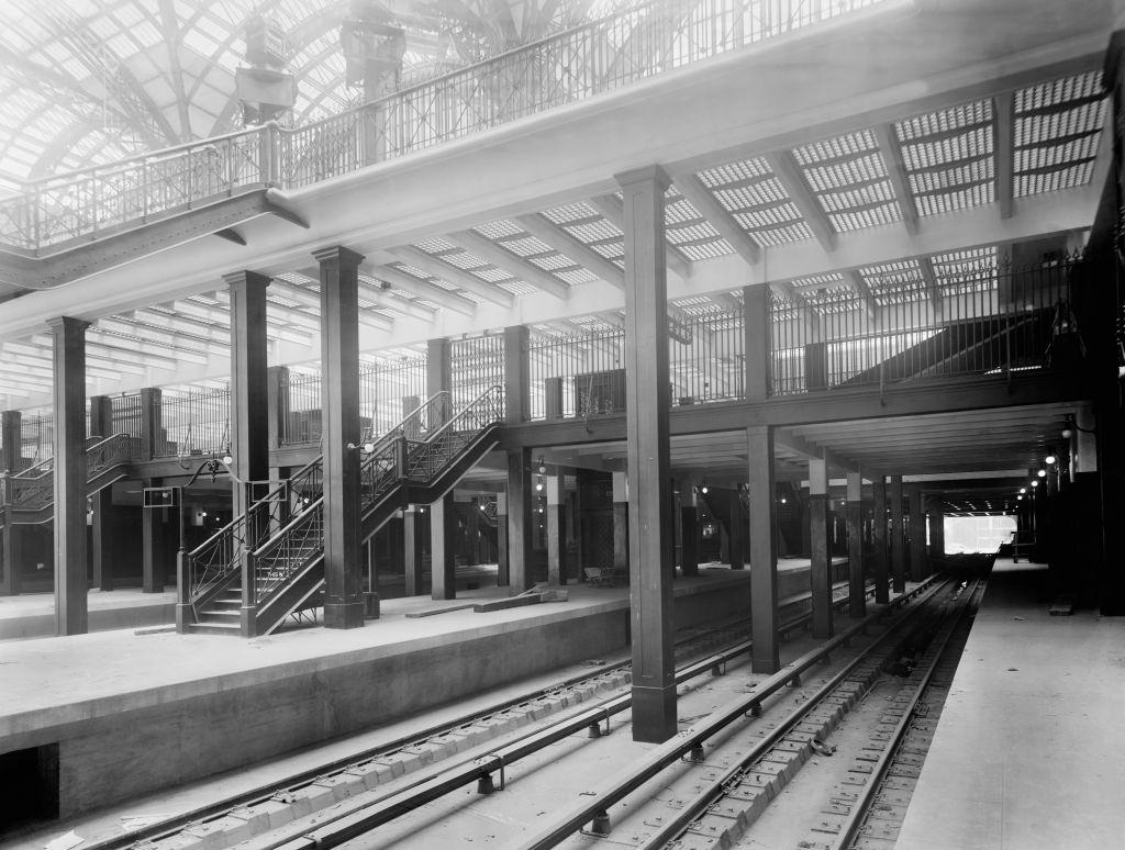 Track Level Showing Stairway and Elevators, Pennsylvania Station, New York City, 1910.