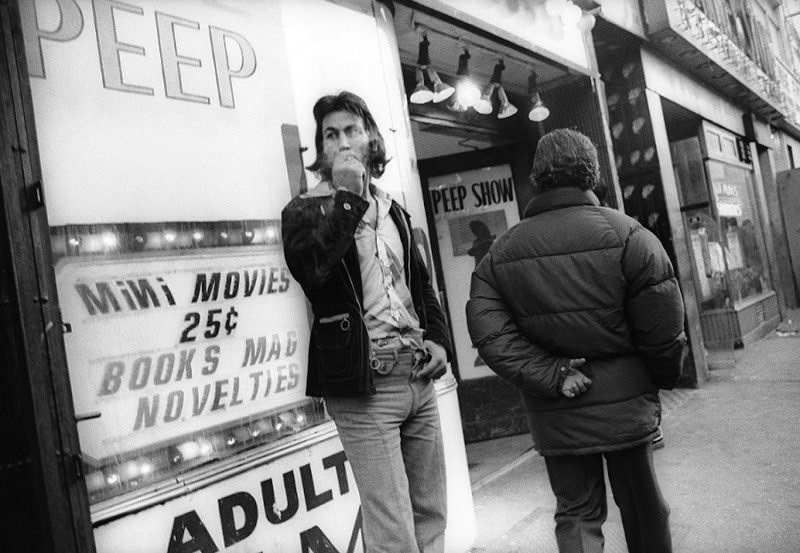 A 25-cent peep show, one of the first adult businesses to appear in Times Square in 1966. Highly profitable, these venues paved the way for adult theaters, strip clubs, and sex shops.