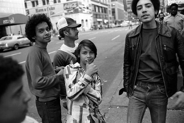 Hustlers and their adult customers openly interact on the streets.