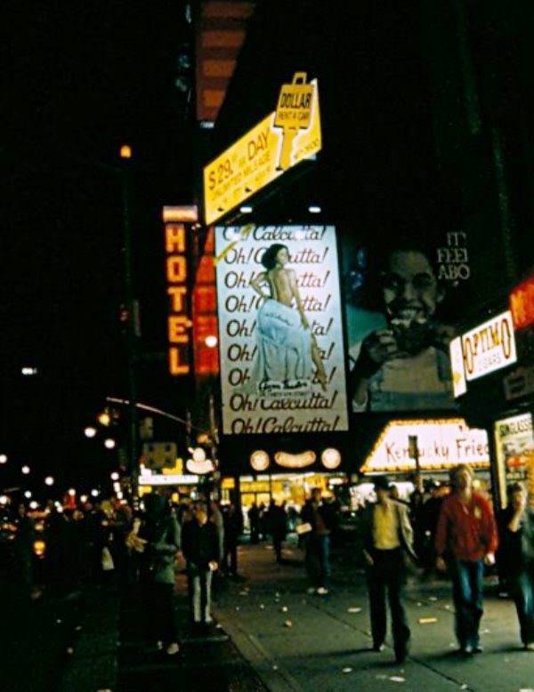 A massive advertisement for the erotic musical Oh! Calcutta! dominates 8th Avenue and 42nd Street, New York City, 1981.