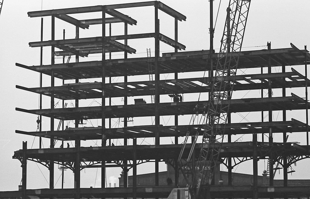 Silhouettes of construction workers.
