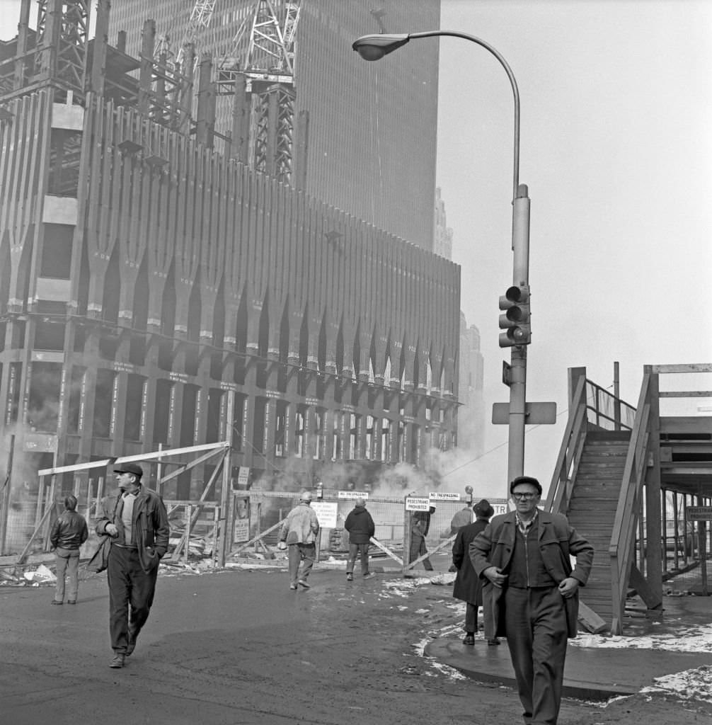Workers enter and leave the World Trade Center construction site in Downtown Manhattan, 1970.