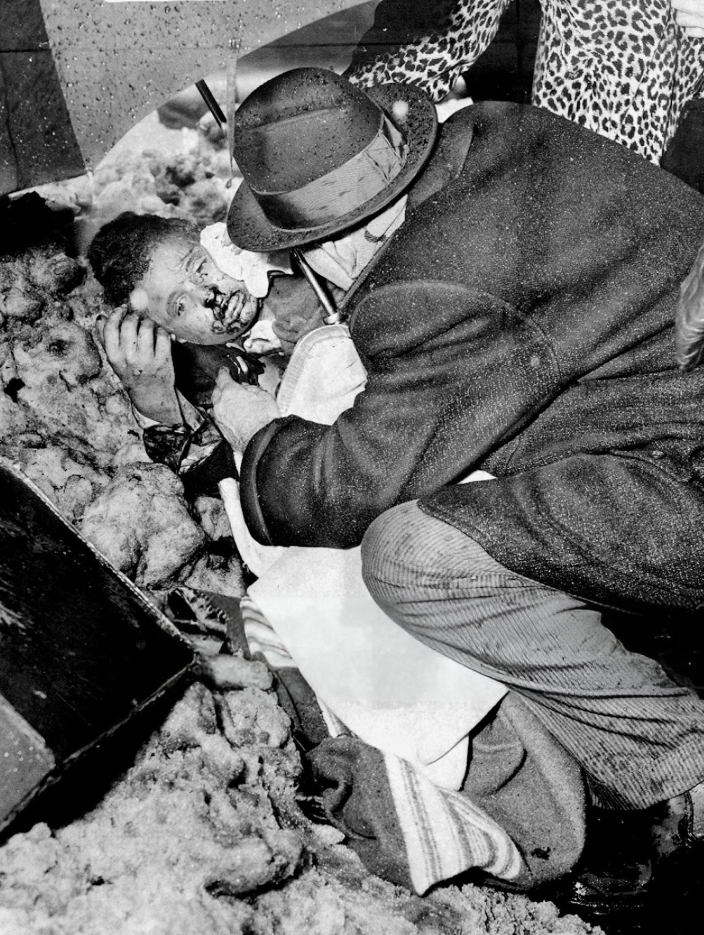 Steven Baltz, 11, Survivor Of A Plane Crash, Is Aided After Two Planes Collided And Crashed In Park Slope, Brooklyn, 1960.