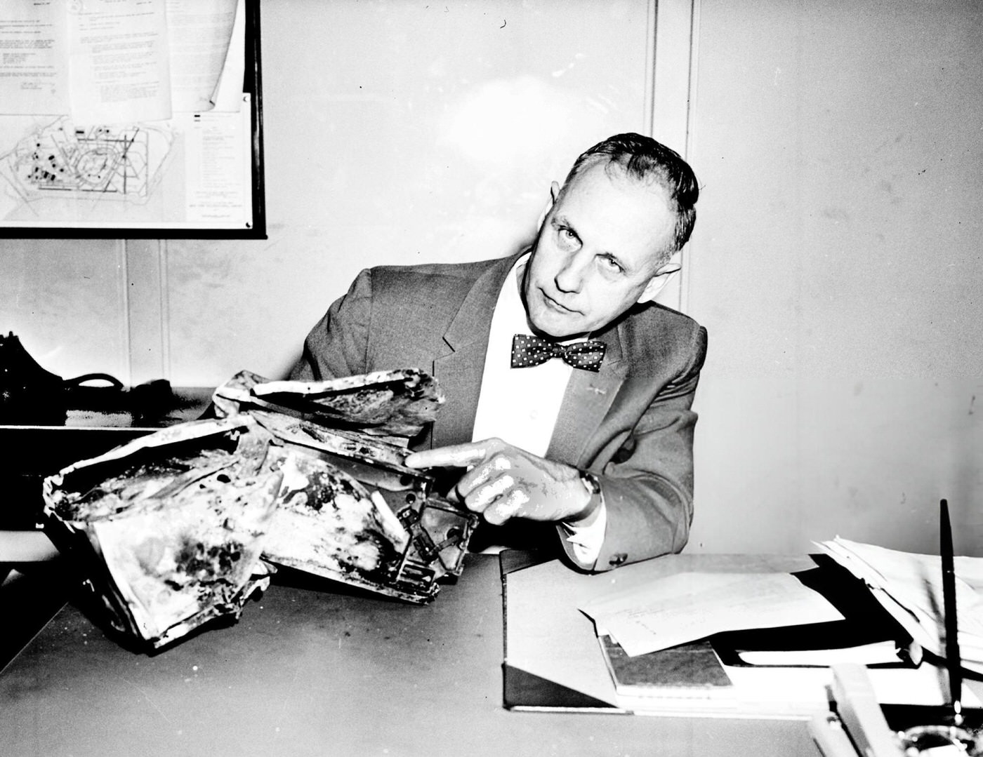 George Van Epps, Eastern Area Supervisor Of The Cab Bureau Of Safety, Holds The Battered Black Box That May Provide Answers To The Mystery Of The Plane Collision, 1960.