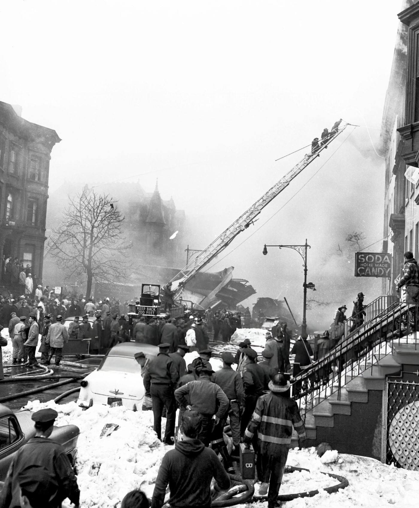 Three Firemen Climb An Extension Ladder To Battle A Blaze At Seventh Avenue And Sterling Place After The United Airlines Dc-8 &Amp;Amp; Twa Super Constellation Aviation Accident, 1960.