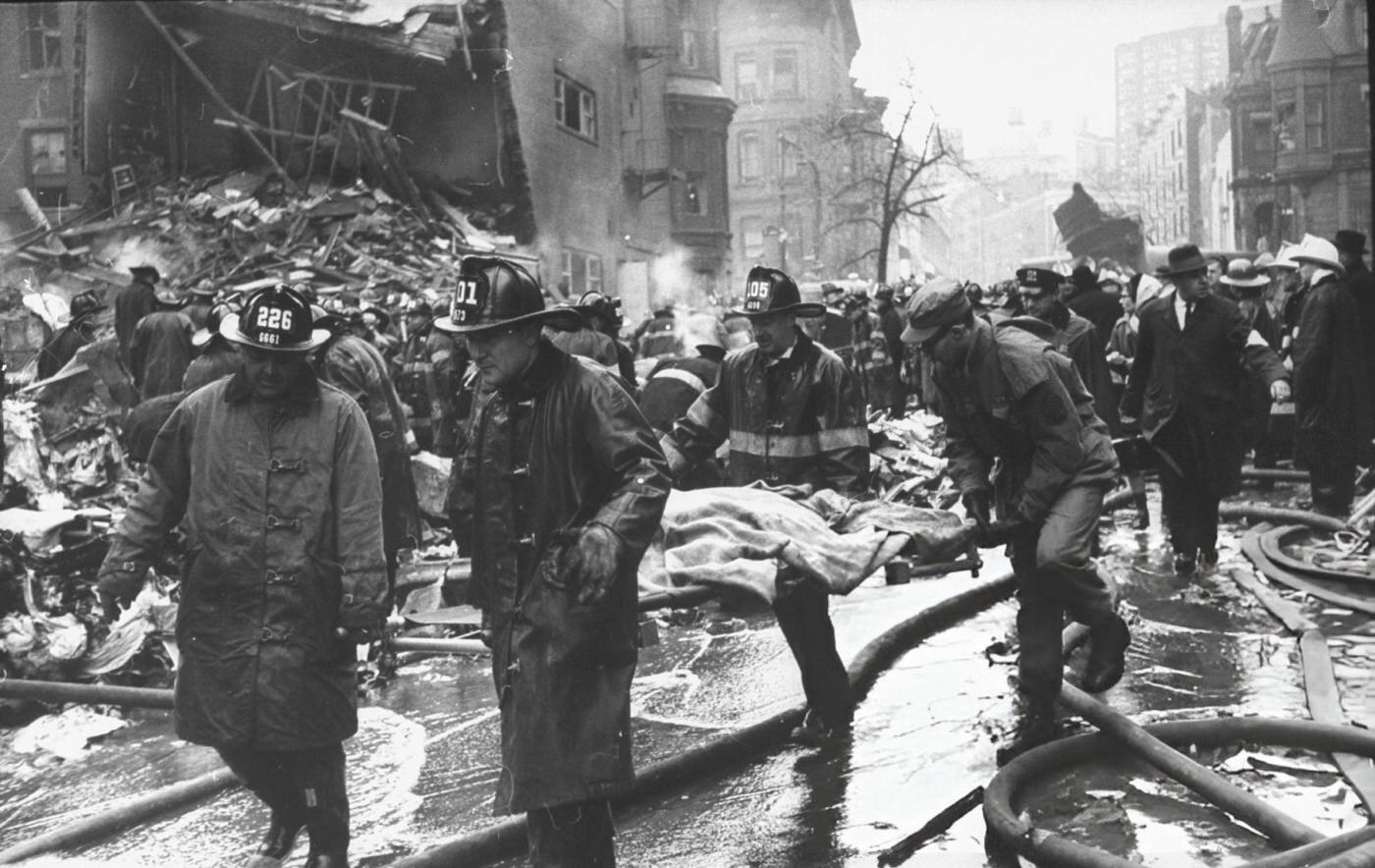 Firemen Remove Bodies From The Scene Of A Two-Plane Crash Over Brooklyn.