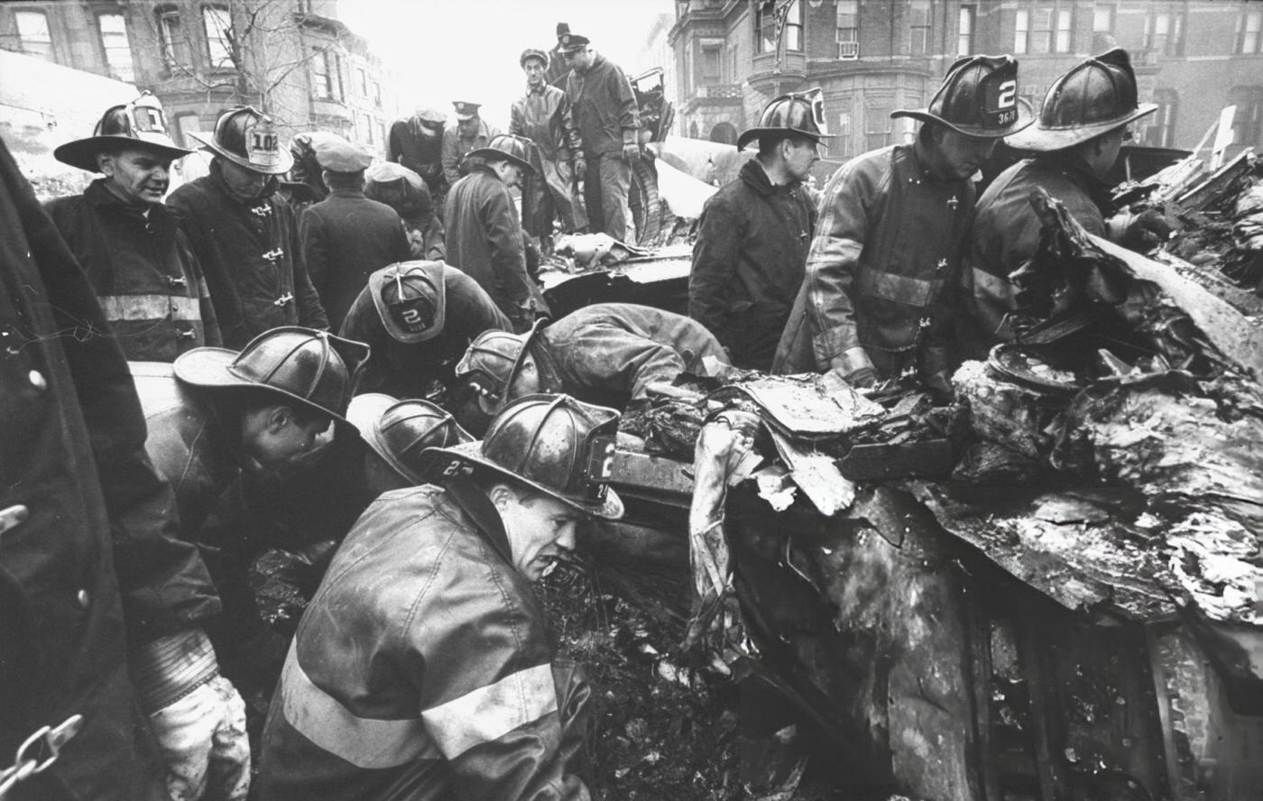 Firemen Inspect The Wreckage Of A Two-Plane Crash Over Brooklyn.