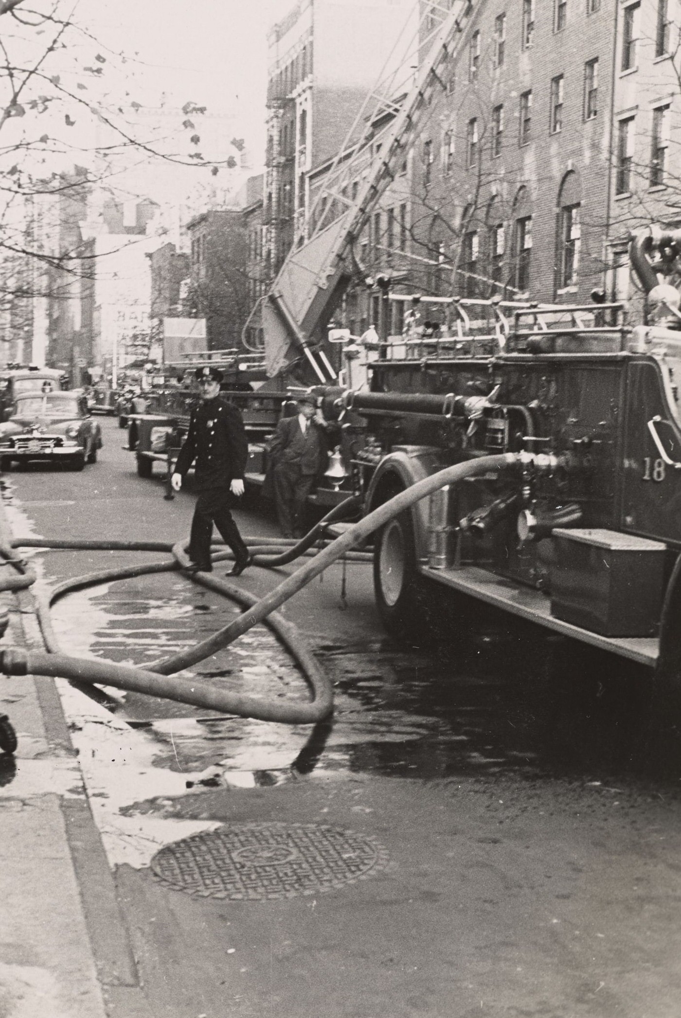 Firemen In Greenwich Village.