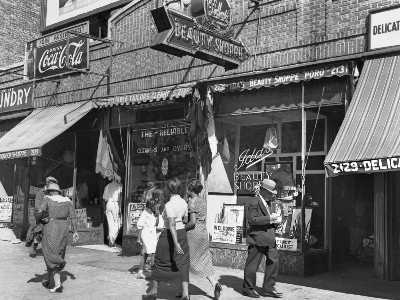 Pedestrians On Lenox Avenue In Harlem, 1935.