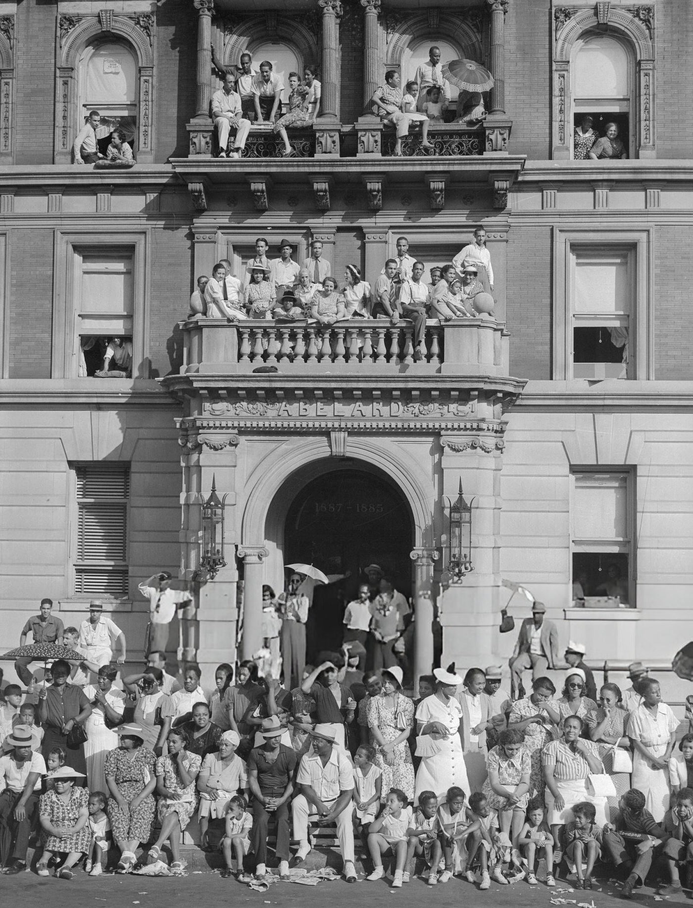 Spectators Watching A Parade On Lenox Avenue In Harlem.