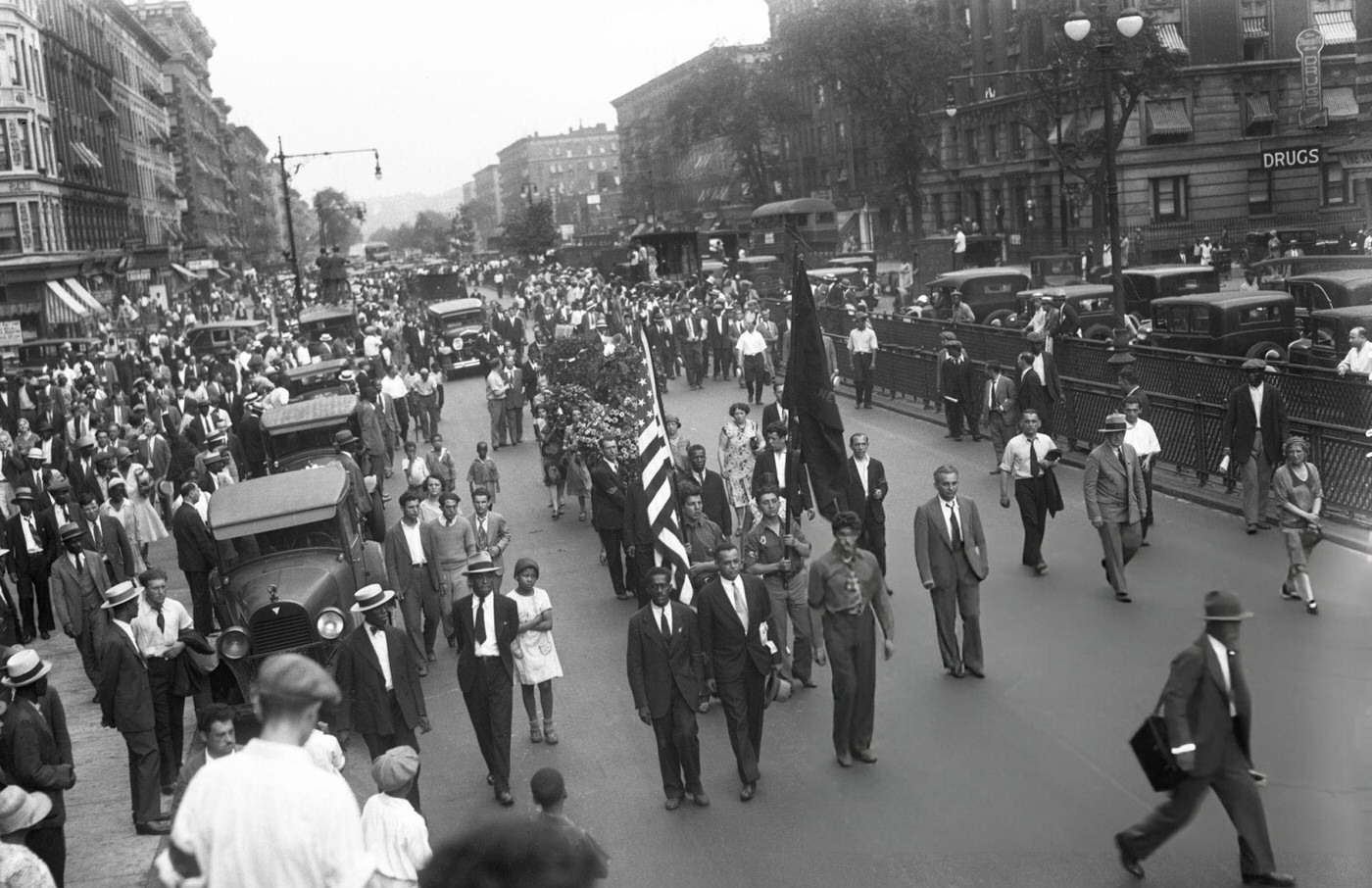 Communist Demonstration In Harlem At The Funeral Of Allad Luro On Lenox Avenue.