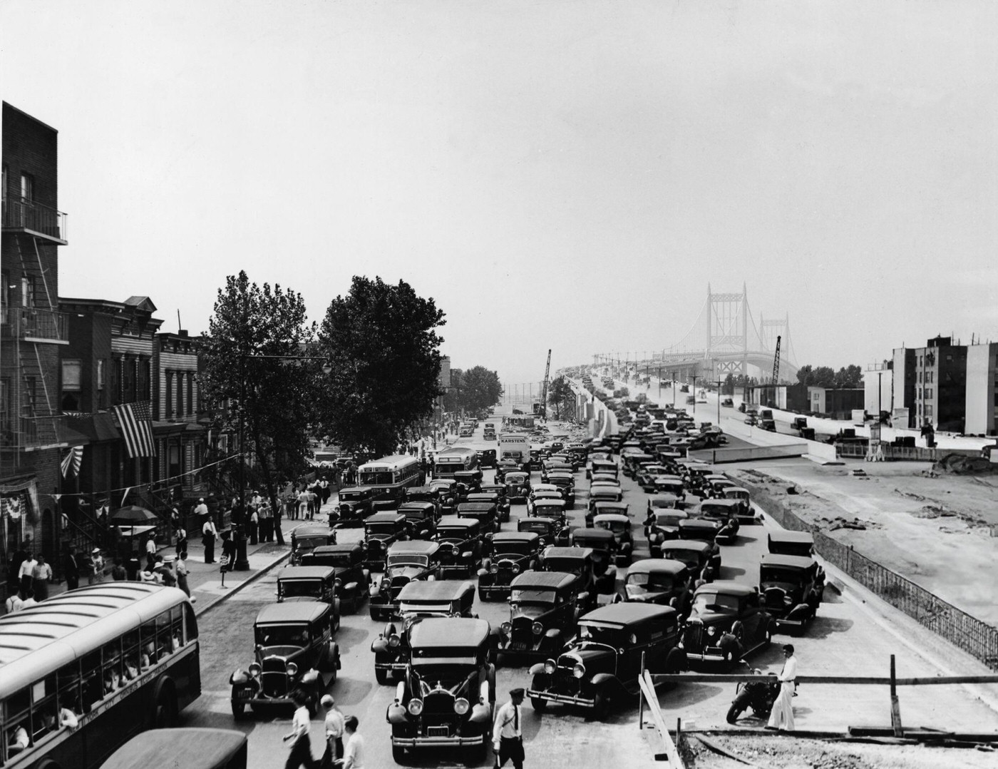 Pedestrians In Front Of Cars Exiting The Triborough Bridge In Harlem, 1936.