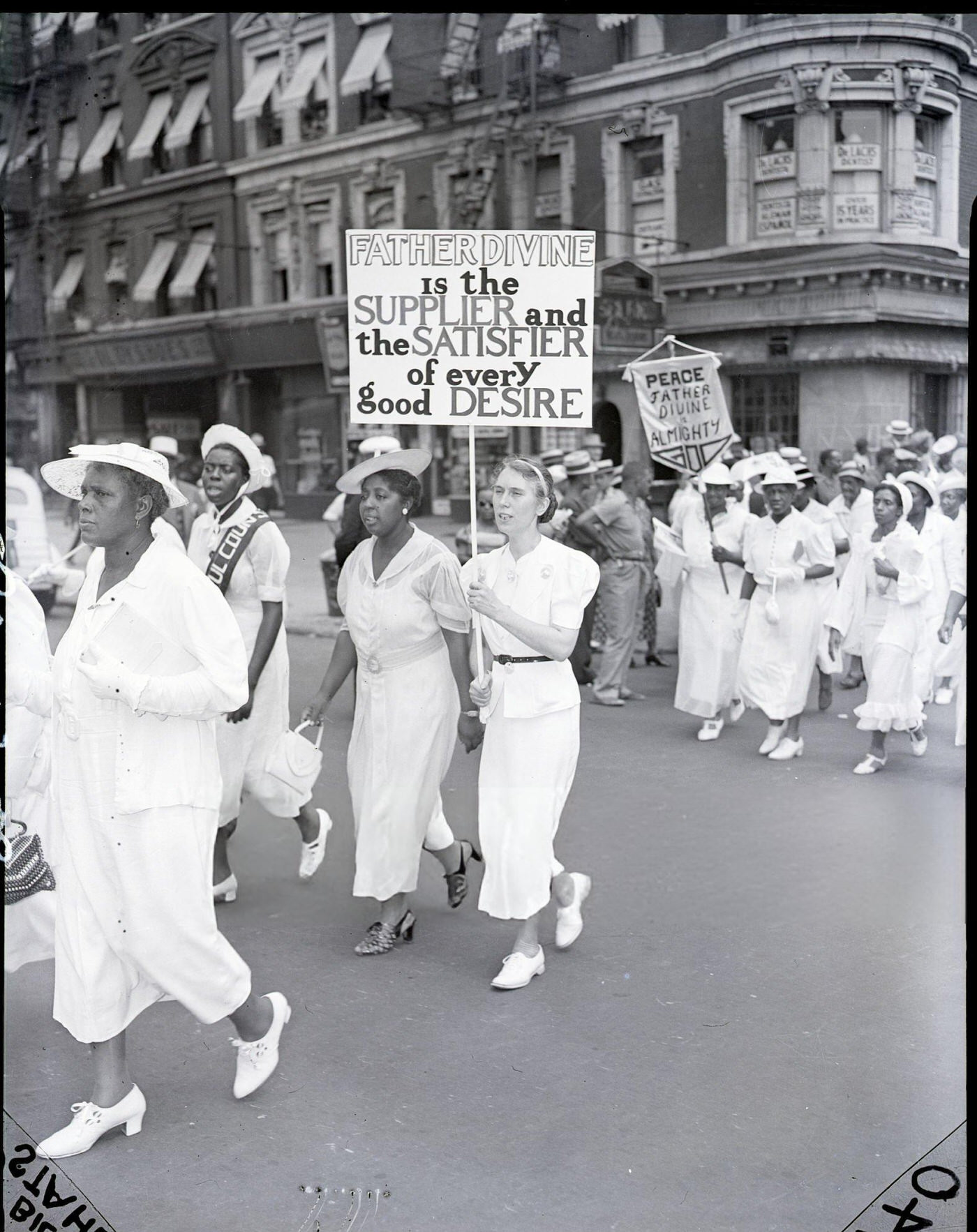 Supporters Of Father Divine Parade Through Harlem, 1938.