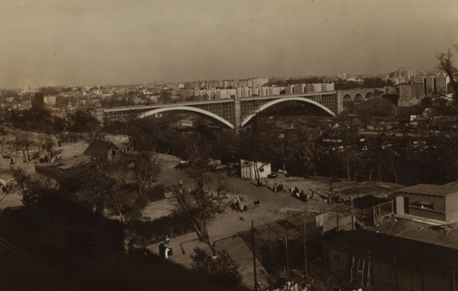 Bridges: Washington Bridge Viewed From 175Th Street And Amsterdam Avenue, With High Bridge In The Background, 1934.