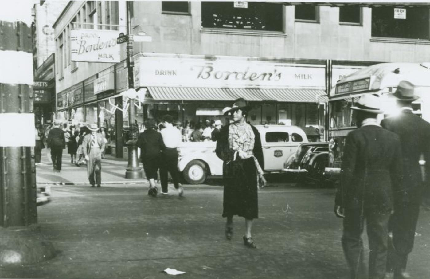 Woman Crossing Street In Harlem At West 125Th Street And Eighth Avenue, 1939.