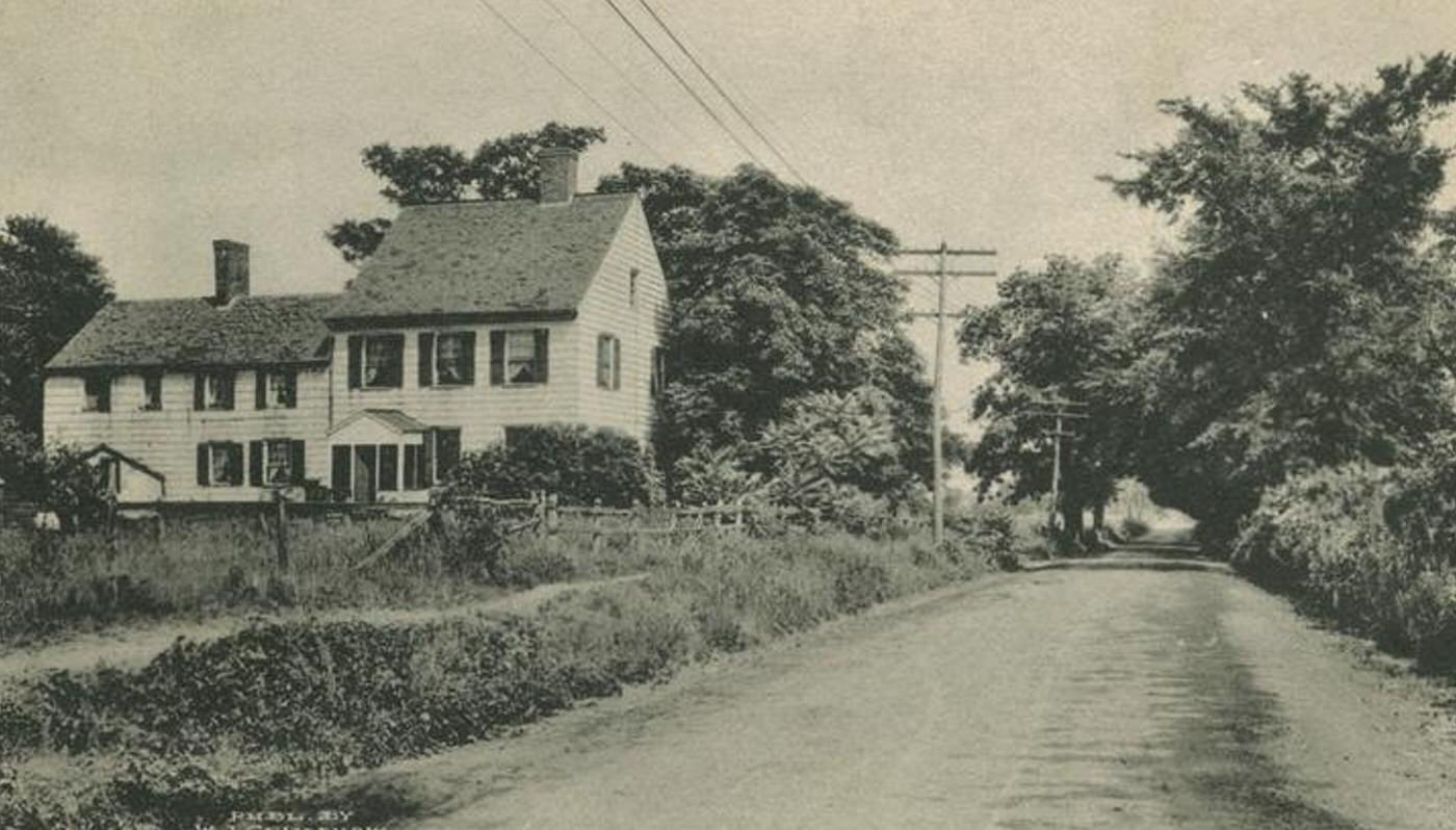 View of New Dorp Lane with one large house, Richmond Borough.
