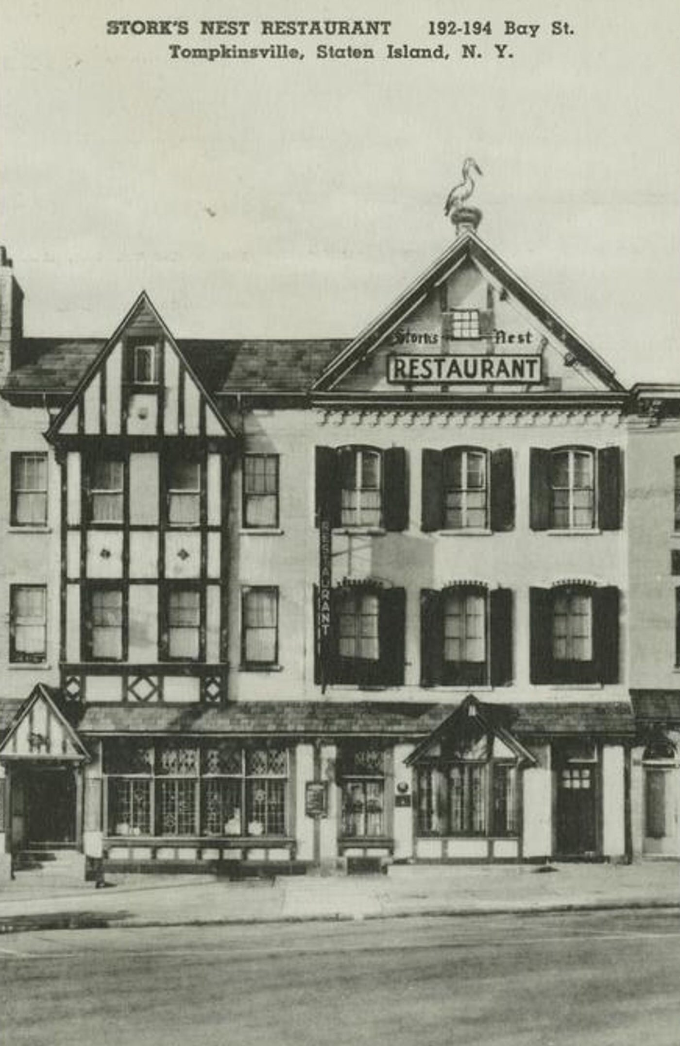 Stork's Nest Restaurant, located at 192-194 Bay St., Tompkinsville, Staten Island, New York, with a stork perched on the chimney.