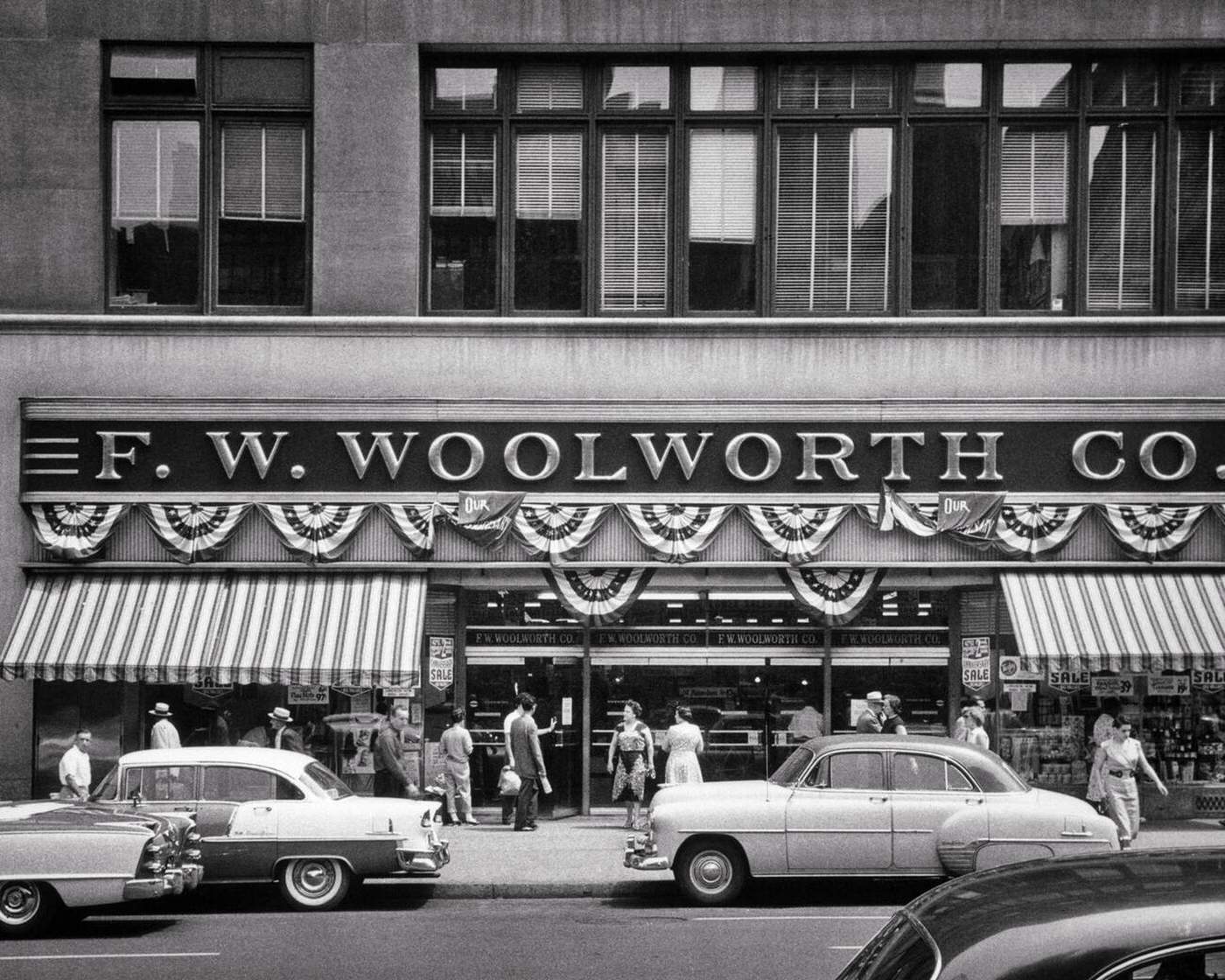 Woolworth Department Store Storefront Decorated With Bunting For Special Sale, 42Nd Street West Of 5Th Ave, New York City, 1950S.