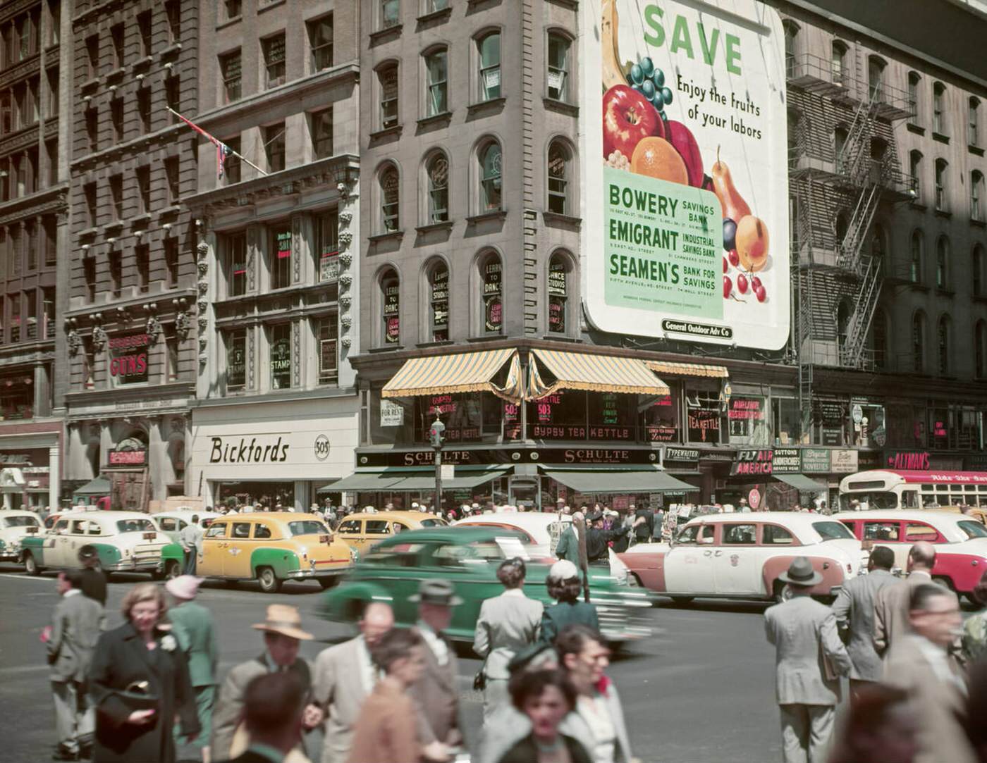 Traffic &Amp;Amp; Pedestrians At The Intersection Of Fifth Avenue And 42Nd Street In Midtown, With A Large Billboard For Savings Bank Ads, New York, 1950S.