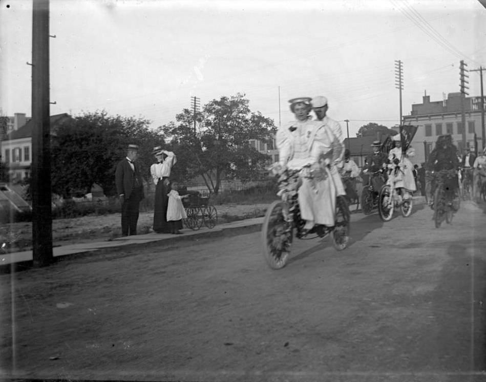 Couple On A Tandem Bike In A Bicycle Parade, Bronx, 1898.