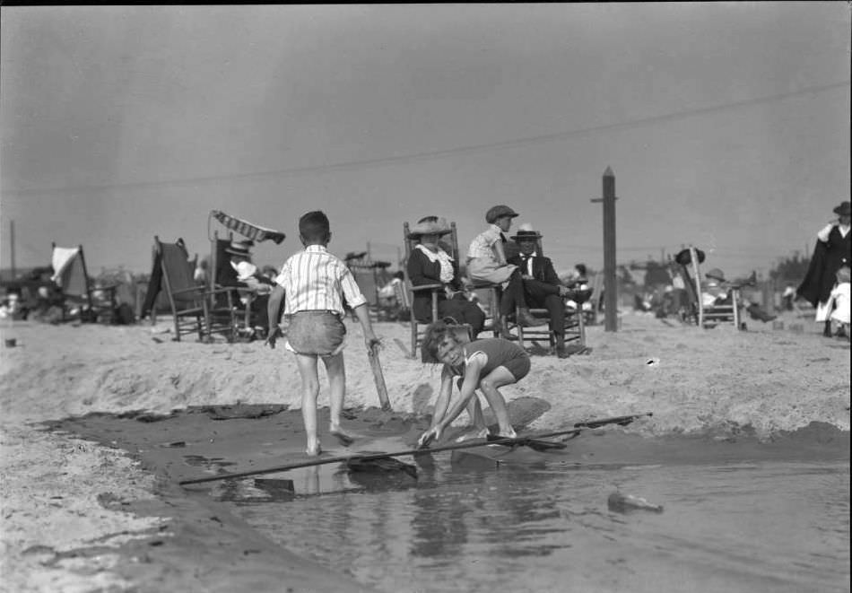 Children Playing In Wet Sand, Brighton Beach, 1920.