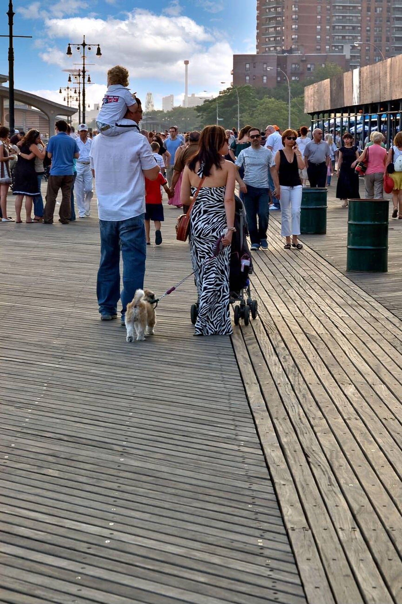 A Family Walking Along A Boardwalk In Brighton Beach, Brooklyn, 2007.