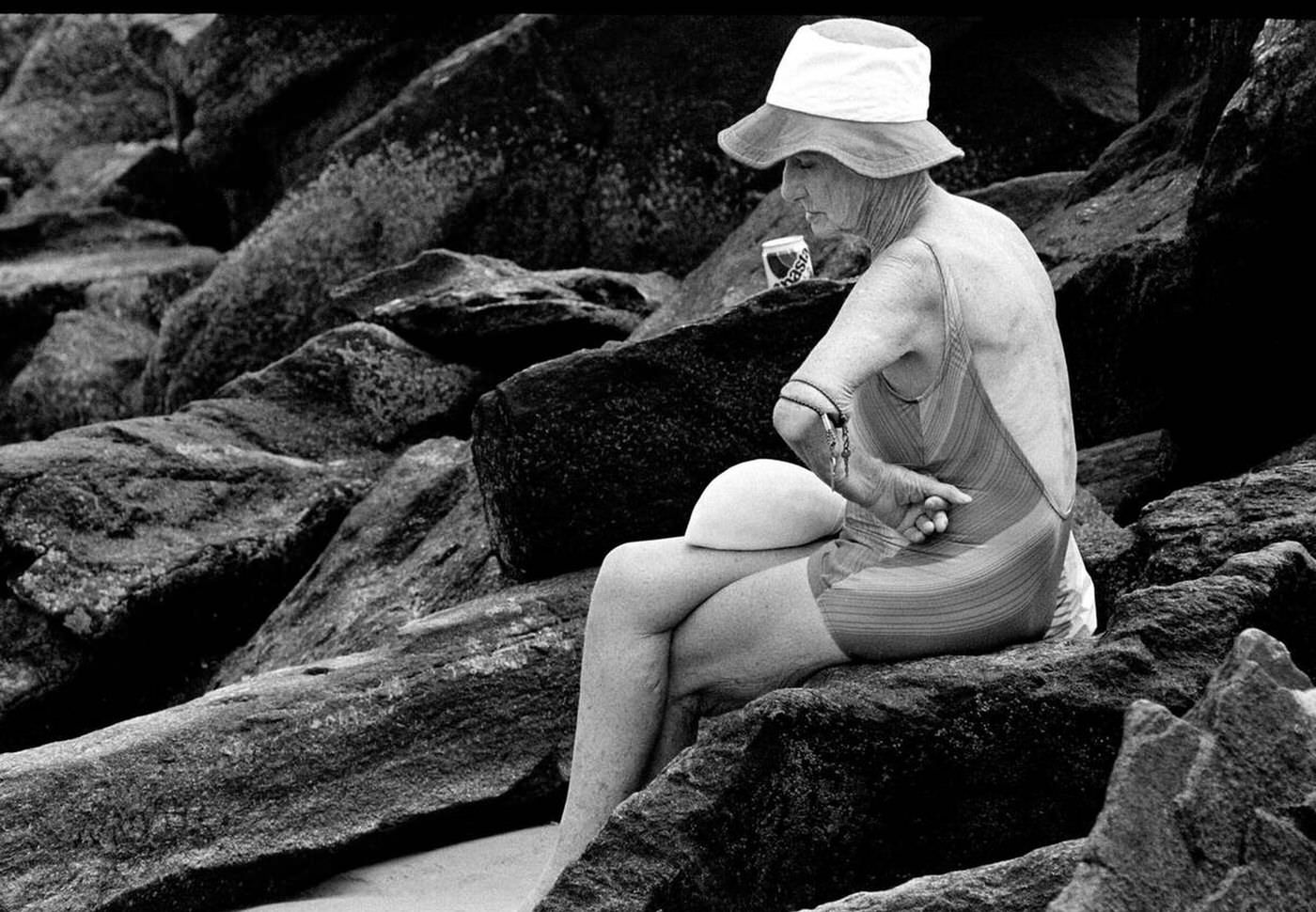 Sitting On The Rocks, Brighton Beach, 1987.
