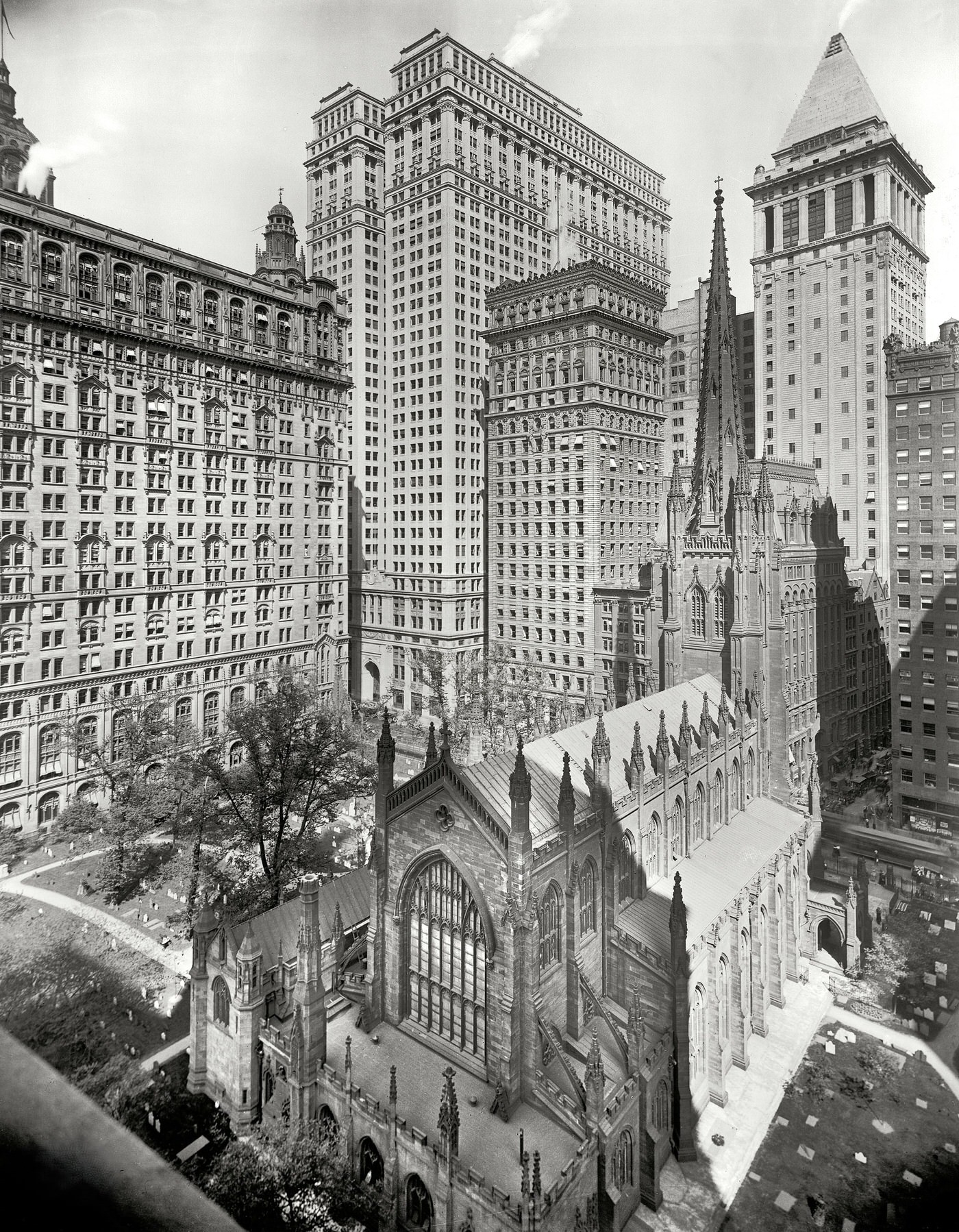Trinity Church And Office Buildings With The Equitable Building And Bankers Trust Tower, 1915.