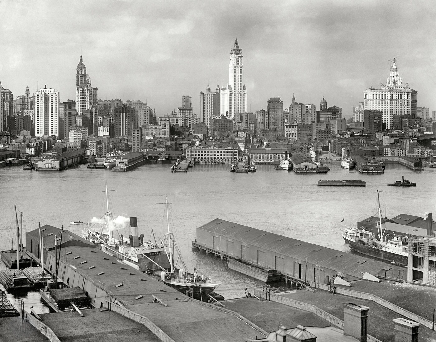 Manhattan Skyline From Brooklyn With The Singer Building, Woolworth Tower And Municipal Building, 1912.