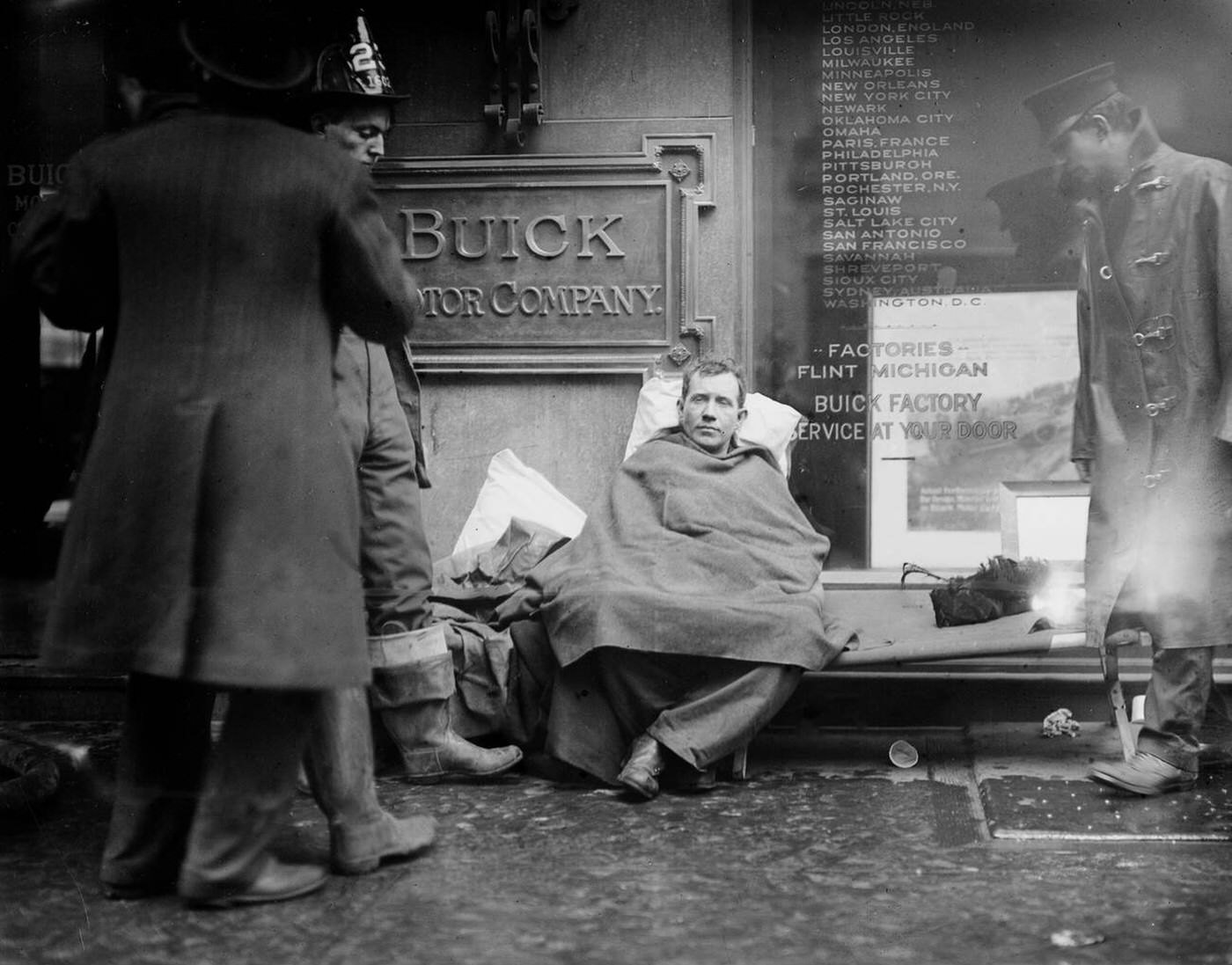 Fireman Seated On The Sidewalk After Fighting A Fire In A New York City Subway Tunnel Near West 55Th Street And Broadway, 1915.