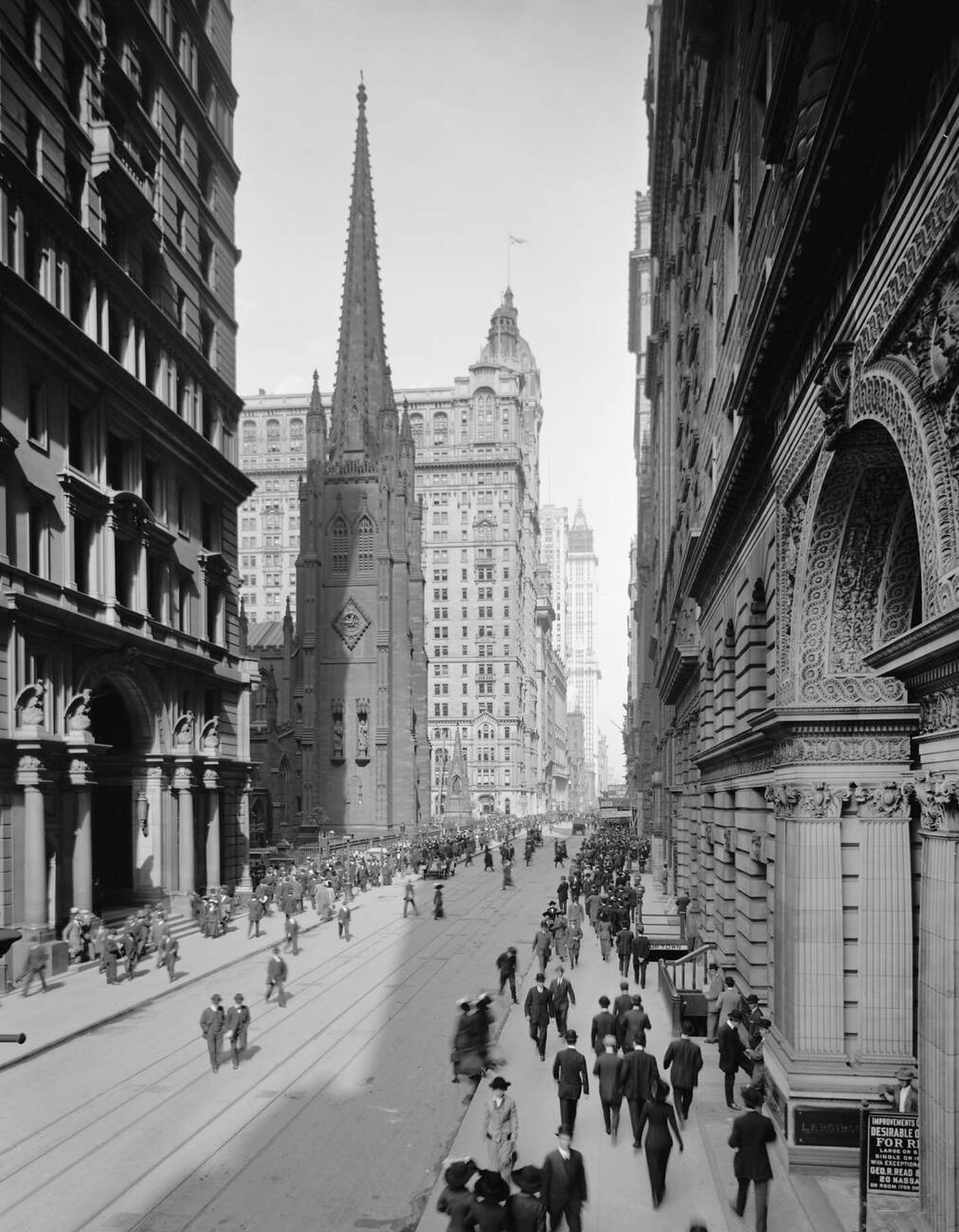 Street Scene, Broadway And Trinity Church, New York City, 1915.