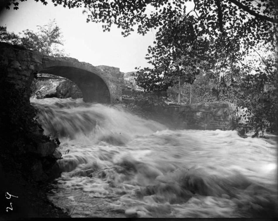 Stone Bridge With Flooding River In Bronx Park, Bronx, 1902.