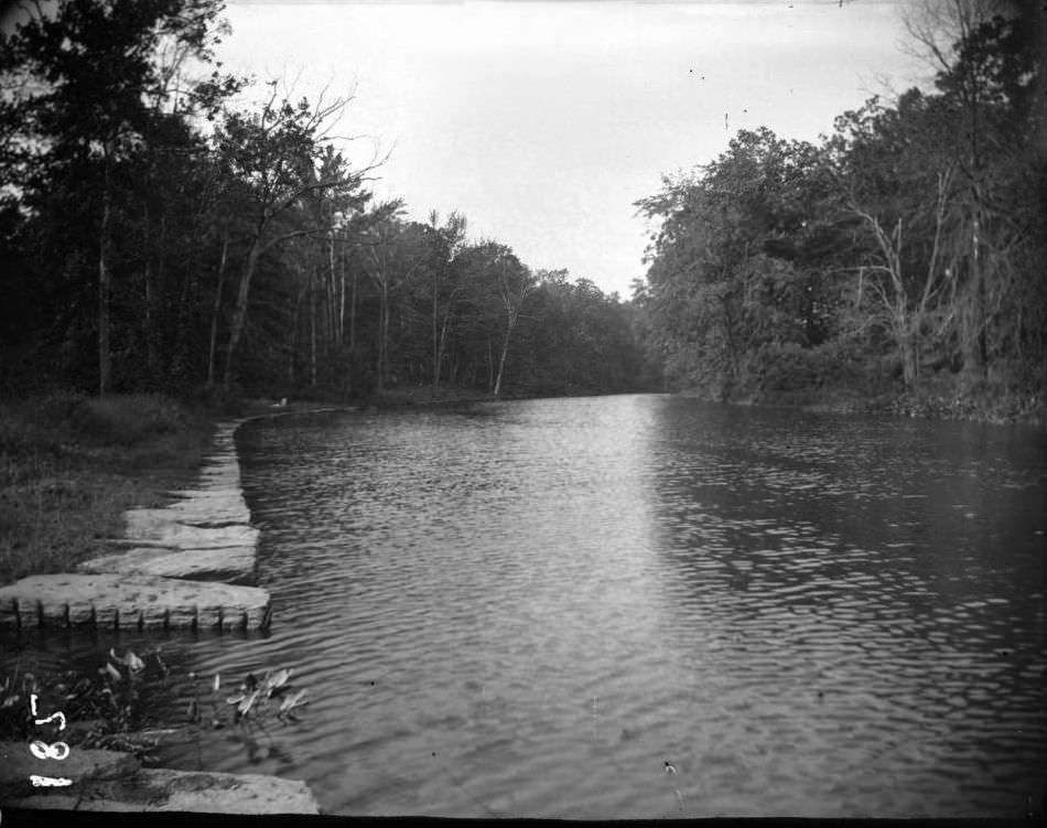 River With Stone-Edged Bank In Bronx Park, Bronx.