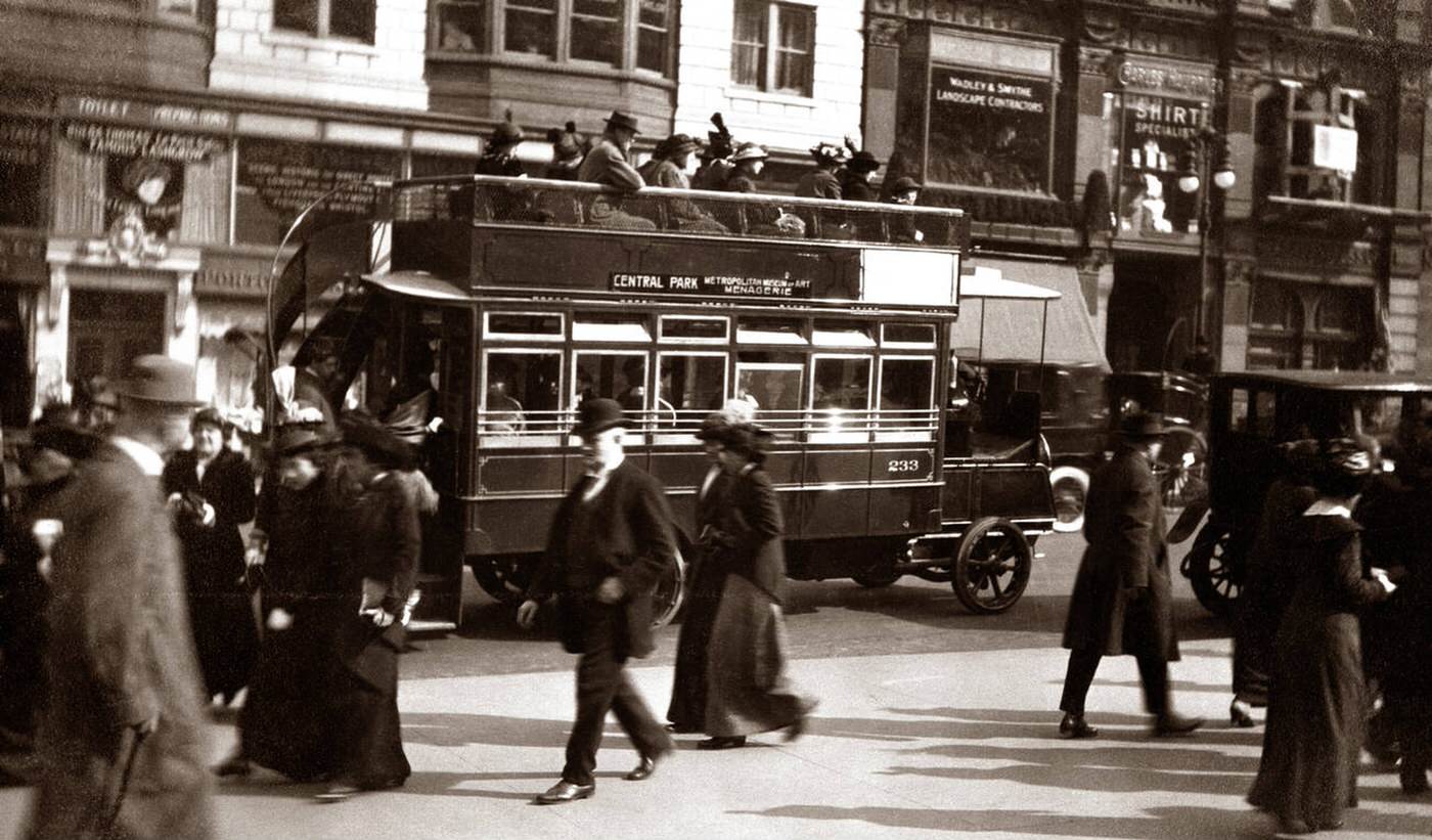 Street Scene With Pedestrians, Traffic, Cars, And A Double-Decker Bus On Fifth Avenue, Manhattan, New York City, 1900S.