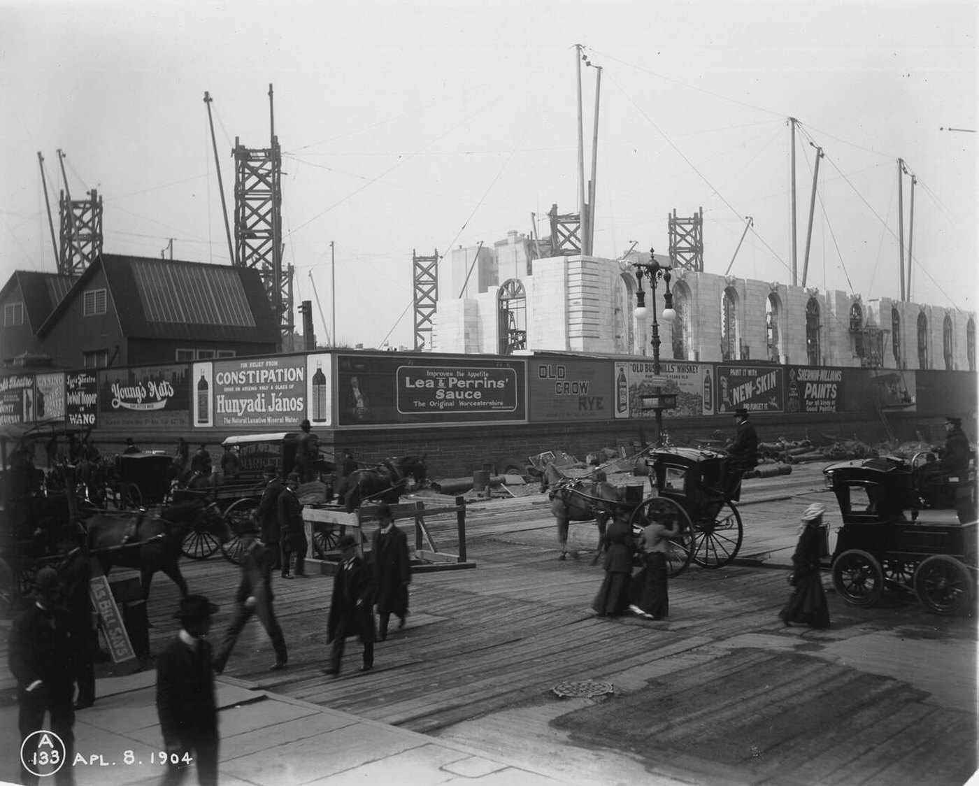 People Walk Past A Building Under Construction At The Corner Of Fifth Avenue And Forty Second Street, New York City, 1904.