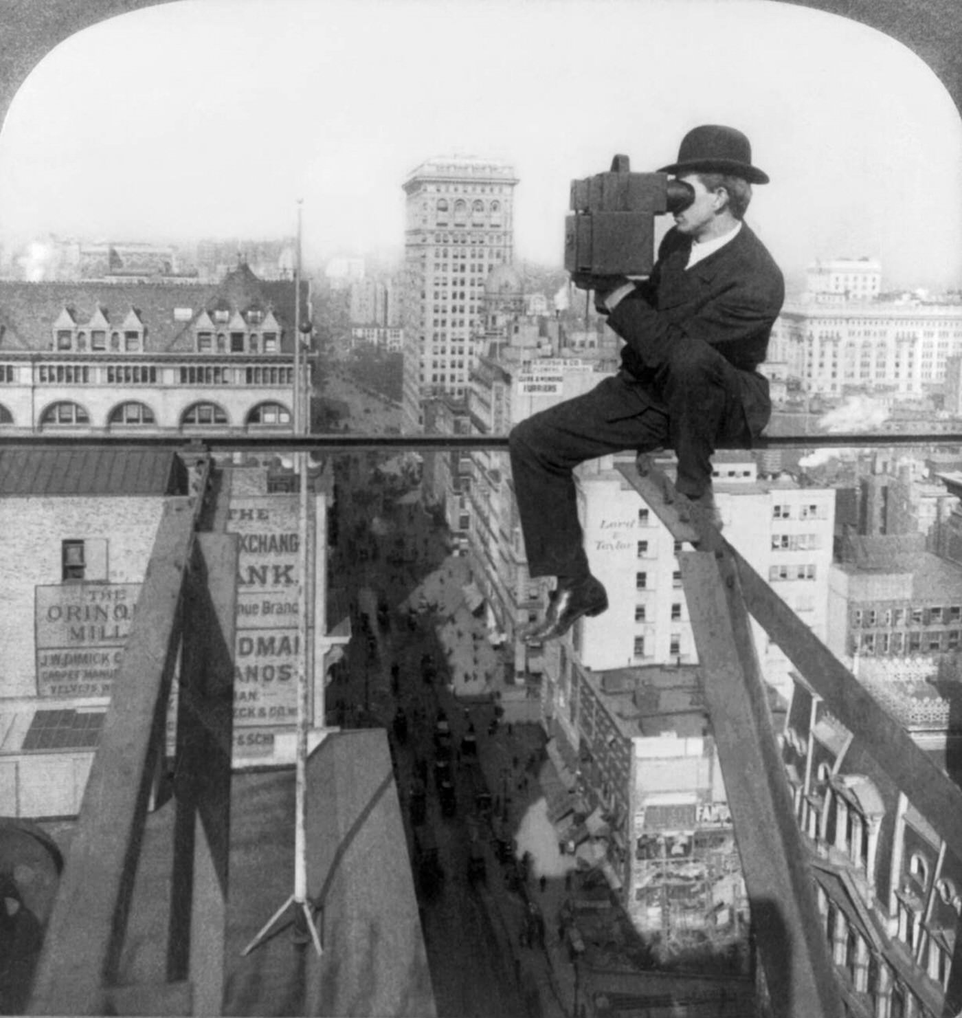 Photographer On A Beam Above Fifth Avenue Photographs A Scene In New York City, 1907.