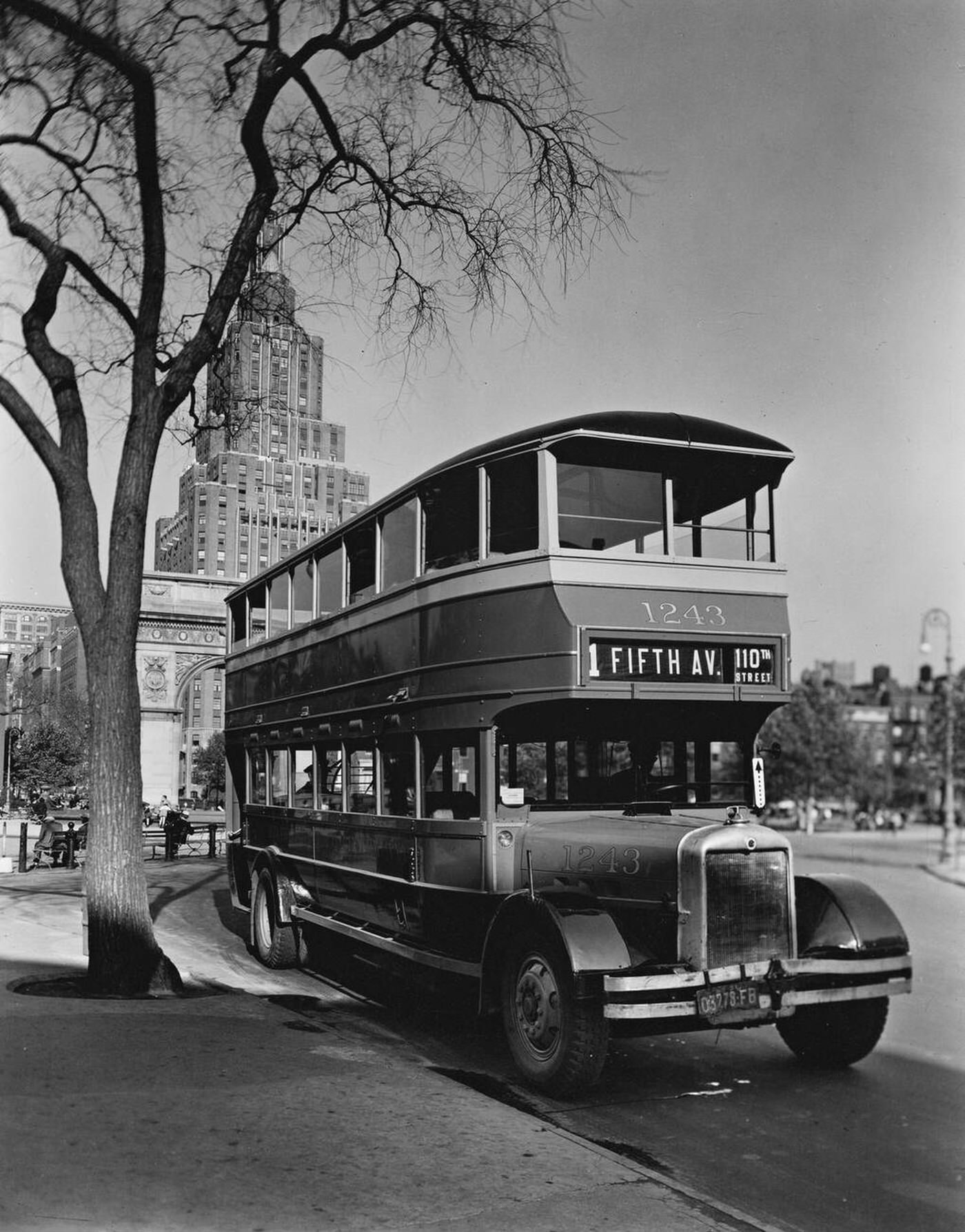 Double-Decker Bus Parked By Tree In Washington Square.